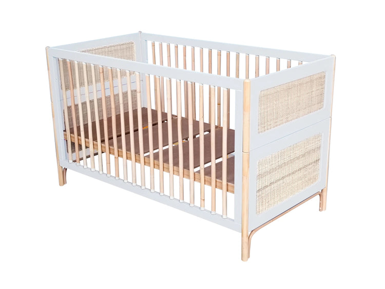 Position intermédiaire du sommier du lit bébé évolutif 70x140 en bois blanc