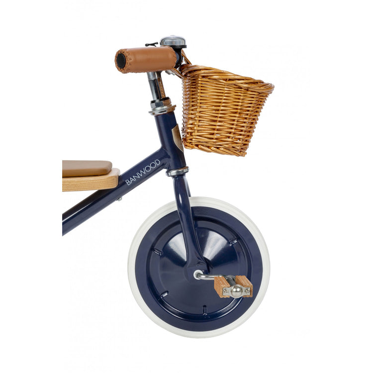 Vue latérale du tricycle en métal vintage Banwood bleu navy